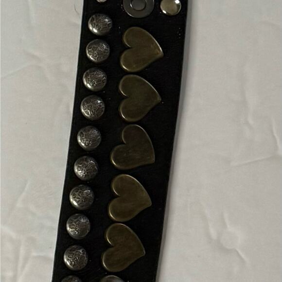 Brambilla Made in Italy multi metal studs around the belt .Measures 45 inches